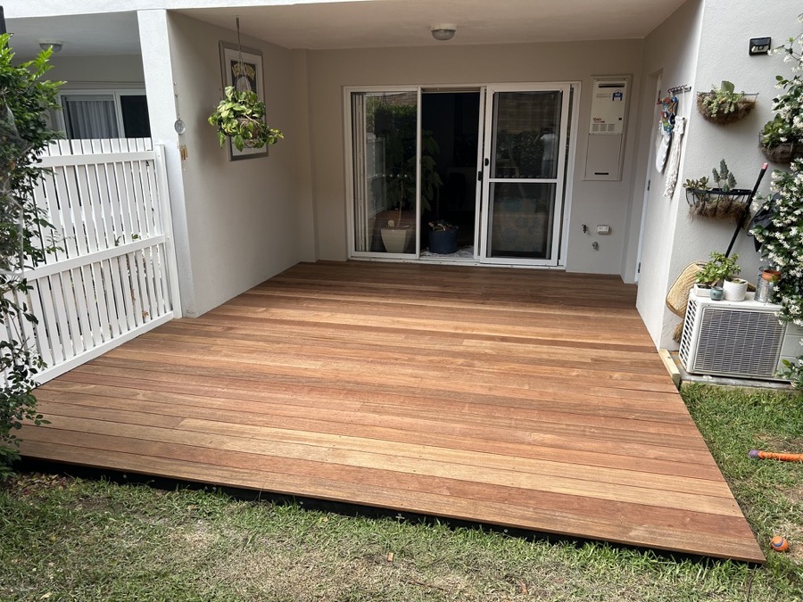 New deck with white fence and pergola — Warriewood